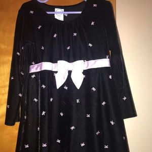 Black with pink bows.  Size 5t
